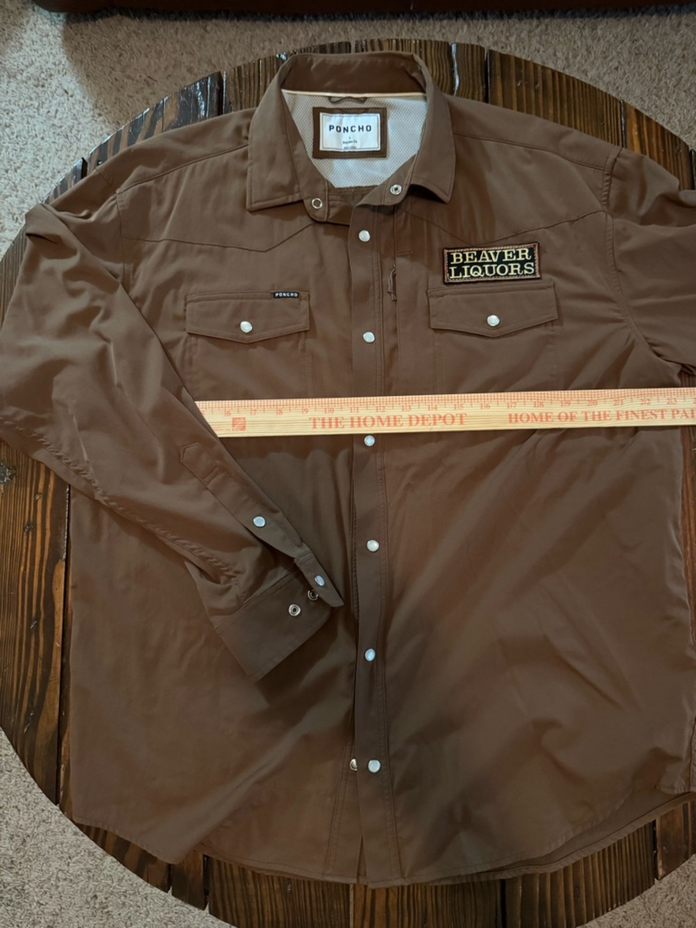 Poncho Outdoors brown pearl snap size Large regular with Beaver Liquors Patch